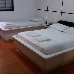 Quarto padrão para três pessoas